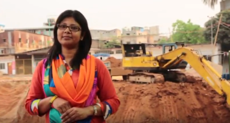 Salma Khuky standing at a construction site in Bangladesh