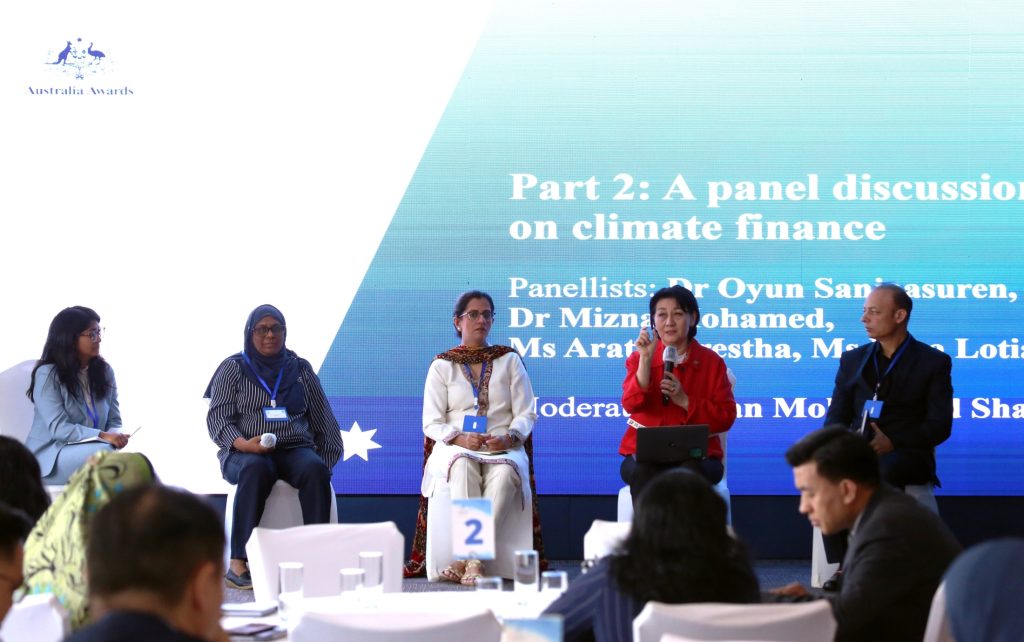 Image of Dr. Oyun (second from right) participating in a panel discussion on climate finance during the 2023 Regional Alumni Workshop in Mongolia.