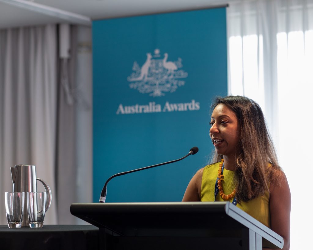 Alum Rakshya Risal presenting at the 2024 Scholars Forum in Canberra.