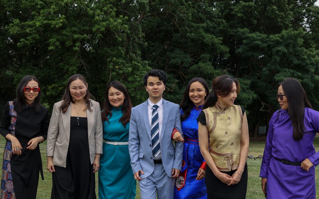 Tuvshe (second from left) pictured with other Mongolia scholars at the 2024 Scholars Forum in Canberra.