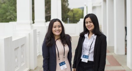 Two Australia Awards scholars at a forum