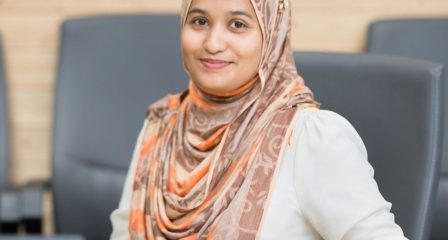 Maldivian Australia Awards alumna Shaana Farooq seated at a meeting