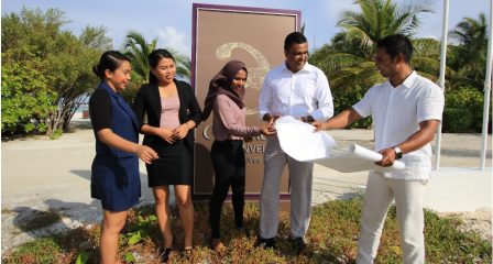 Sanjeeva Perera and colleagues review plans at a coral propagation site in Maldives