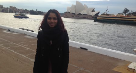 Thoiba Saeedh stands near the Sydney Opera House