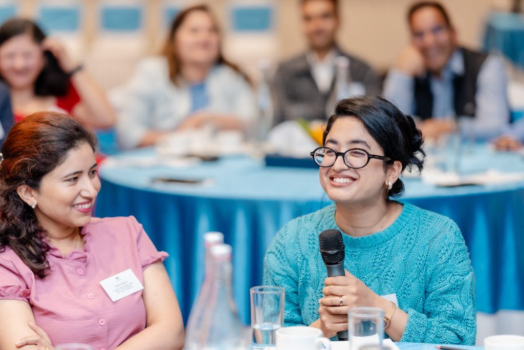 Reintegration event celebrates alumni returning from Australia