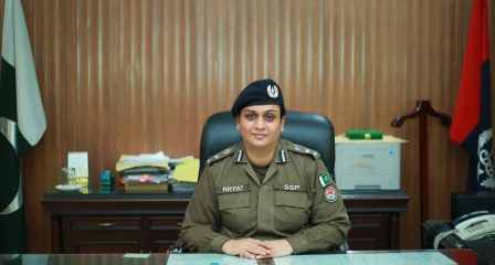 Pakistani Australia Awards alumna and police officer Riffat Bokhari at her desk